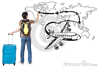 Young traveler drawing airplane and airline path on the map Stock Photo