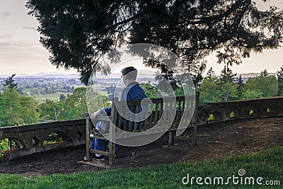 Young traveling man enjoys the distance view Stock Photo