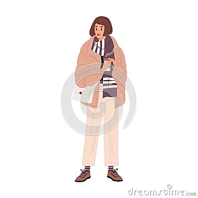 Young trendy woman in warm winter or autumn clothes. Seasonal fashion. Modern female character in down jacket, pants Vector Illustration