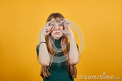 Young trying open eyes with fingers, sleepy, tired morning fatigue. need sleep Stock Photo