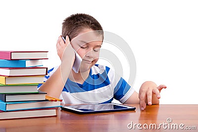 Young tween boy chatting on a mobile phone Stock Photo