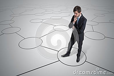 Young unsure man is making decision. Strategy and choice concept Stock Photo