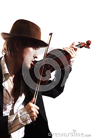 Young violinist playing the violin in hat a Stock Photo