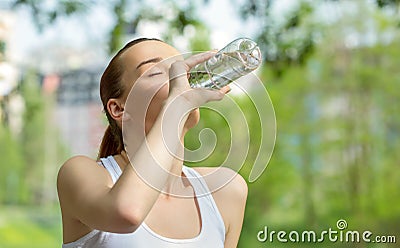Young vitality woman drinking water Stock Photo
