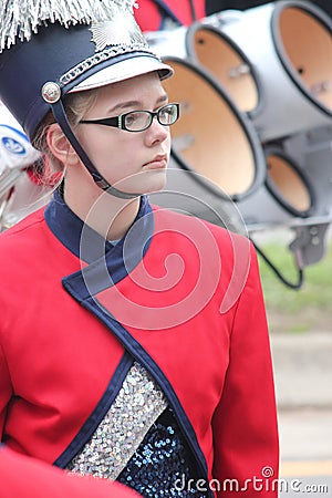 Young white girl with glasses in a marching band in the Cherry Blossom Festival in Macon, GA Editorial Stock Photo