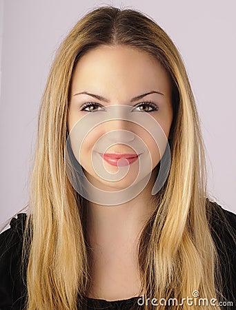 Young woman with beautiful symmetrical face Stock Photo