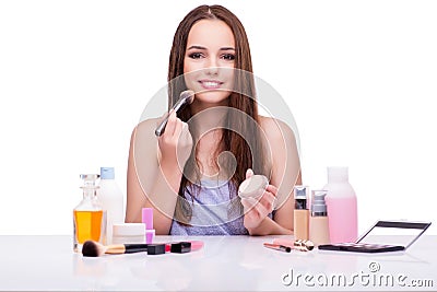 The young woman in beauty make-up isolated on white Stock Photo