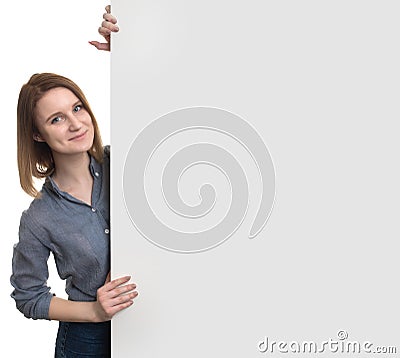 Young woman behind the white stand Stock Photo