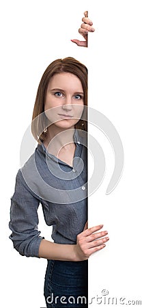 Young woman behind the white stand Stock Photo