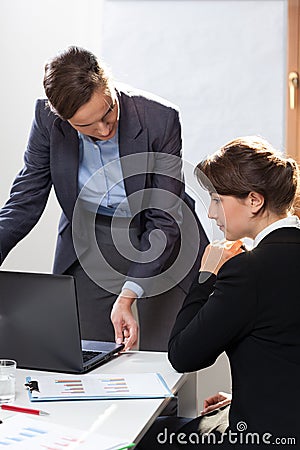 Young woman being on work experience Stock Photo