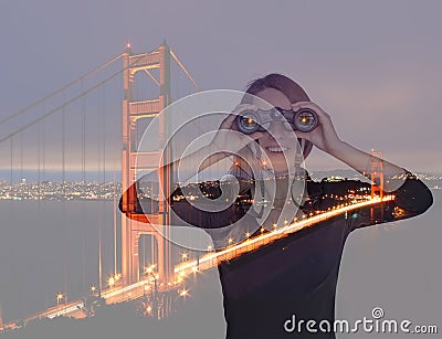 Young woman with binoculars near Golden Gate Bridge. Double expo Stock Photo