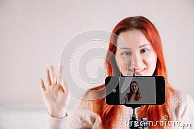 Young woman blogger influencer is recording video for her vlog. Modern businesswoman leading online stream Stock Photo