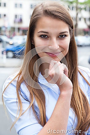 Young woman with blond hair in the city Stock Photo