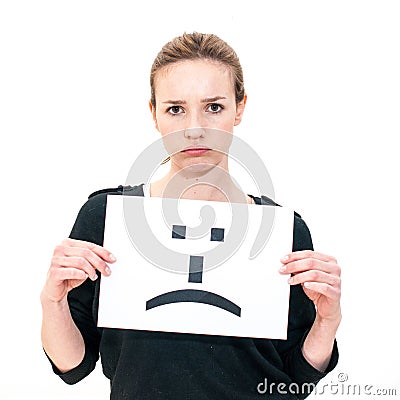 Young woman with board sad emoticon face sign Stock Photo