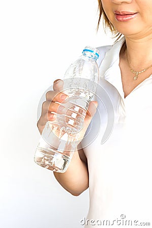 Young woman with bottle of mineral water. Stock Photo