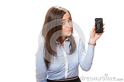 Young woman with broken smartphone. Stock Photo