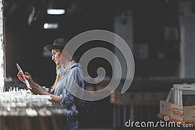 Young woman browsing vinyl records indoors Stock Photo