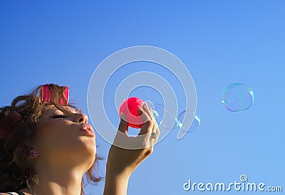 Young woman and bubbles Stock Photo