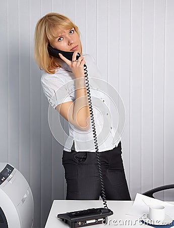 Young woman calls by phone Stock Photo