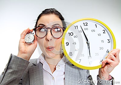 Young woman can`t wait to go home from the nasty office Stock Photo