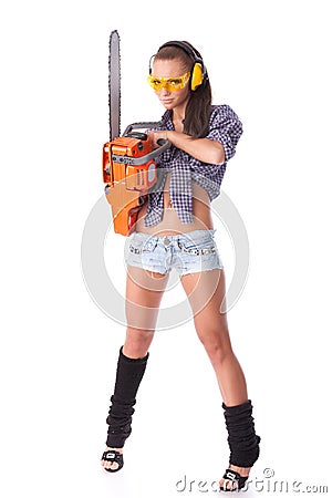 Young woman with a chainsaw Stock Photo