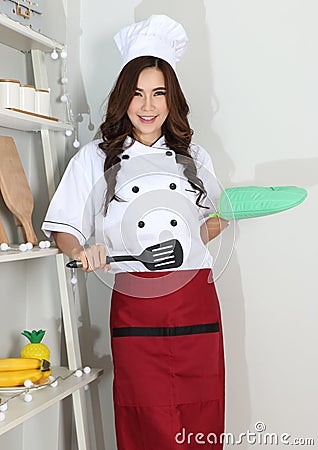 Young woman chef Stock Photo