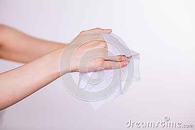 Two hands cleaning with wet wipes Stock Photo