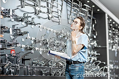 Woman at the plumbing shop Stock Photo