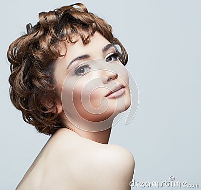 Young woman close up face beauty portrait.Short Hair style. Fem Stock Photo