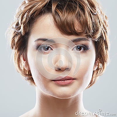 Young woman close up face beauty portrait.Short Hair style. Fem Stock Photo