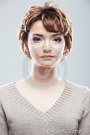 Young woman close up face beauty portrait.Short Hair style. Fem Stock Photo