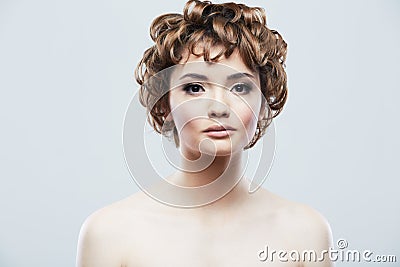 Young woman close up face beauty portrait.Short Hair style. Female model isolaed Stock Photo
