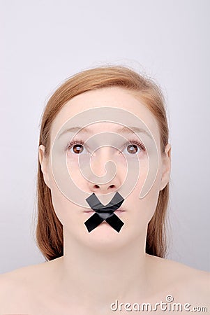 Young woman with the closed mouth Stock Photo