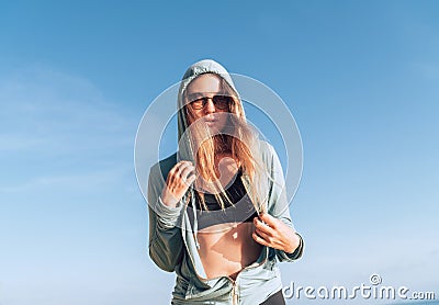 Young woman in comfort fashion sport outfit enjoing with calm morning sun Stock Photo