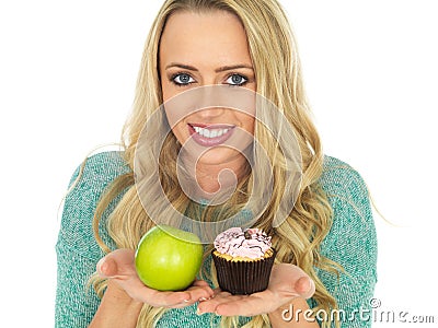 Young Woman Comparing Good and Bad Food Stock Photo