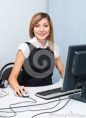 Young woman at computer Stock Photo