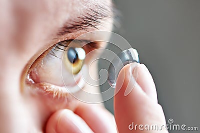 Young woman with contact lens Stock Photo