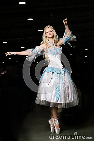 Young woman cosplayer wearing beautiful dress Stock Photo