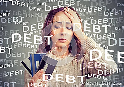 Young woman with credit card debt Stock Photo