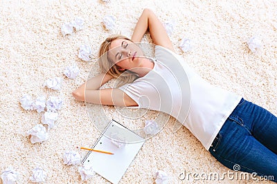 Young woman with crumpled paper Stock Photo