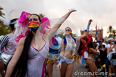 A young woman dancer dances 2021 Pride parade in Barcelona, Spain on September 5, 2021, organized by Lgbti+ and lgbt collectives Editorial Stock Photo