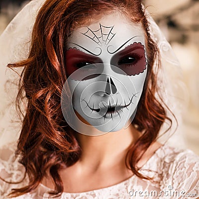 Young woman in day of the dead mask Stock Photo