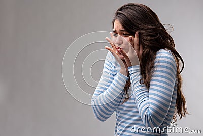 Young woman with a deep yearning or crush Stock Photo