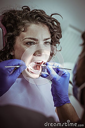 Young woman at dentist`s office for routine checkup. Stock Photo