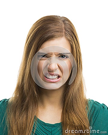 Young woman with a disgusting face Stock Photo