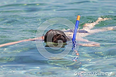 Young woman diving Stock Photo