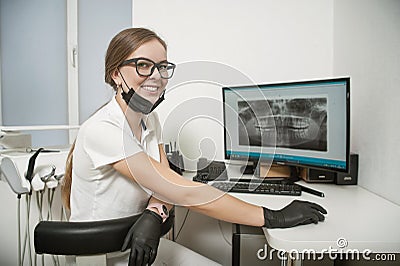 Girl radiologist in the dentist`s office Editorial Stock Photo