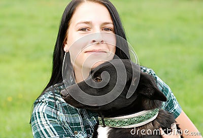 Young woman with dog Stock Photo