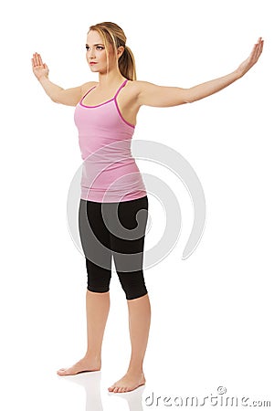 Young woman doing aerobic exercise. Stock Photo