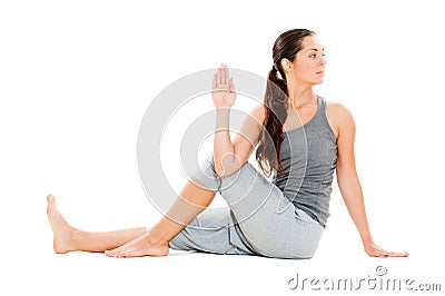 Young woman doing flexibility yoga exercise Stock Photo